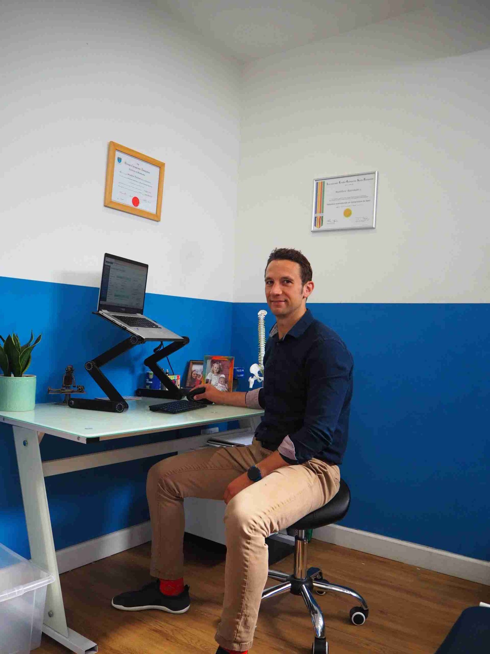 Matt Bateman from ccsussex.com sitting at his desk in his office