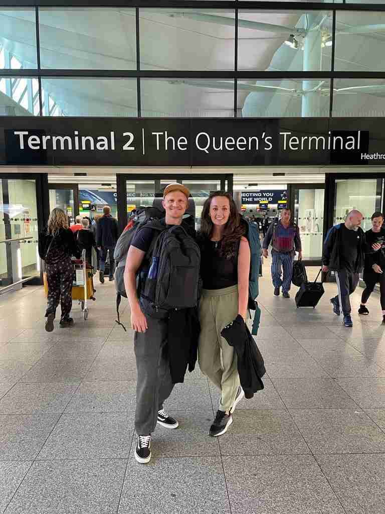 Simon from Sculpt websites with girlfriend Steph outside Heathrow terminal 2 before starting their adventures as digital nomads